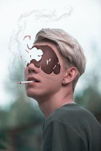 Close-up portrait of boy looking away