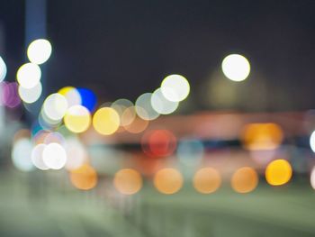 Defocused image of illuminated lights at night