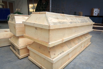 Close-up of coffins on floor