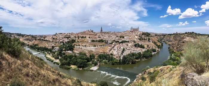 Panoramic view of river and trees against sky