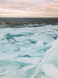 Scenic view of sea against sky during winter