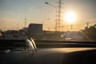 Car against sky during sunset