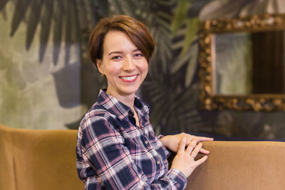 Portrait of smiling young woman