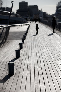 Close-up of wooden structure against sky