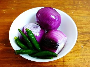 High angle view of chopped vegetables in bowl on table