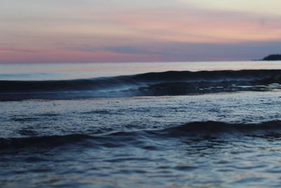 Scenic view of sea at sunset