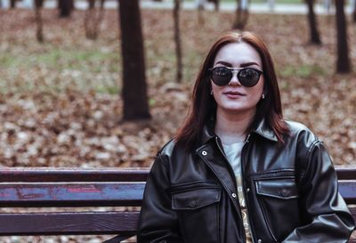 Portrait of woman wearing sunglasses outdoors