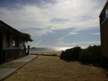 Scenic view of sea against cloudy sky