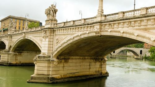 Arch bridge over river