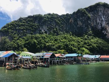 Boats moored at harbor