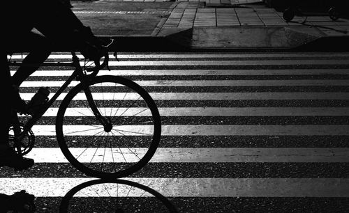 High angle view of person riding bicycle on street