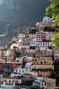 High angle view of townscape by sea