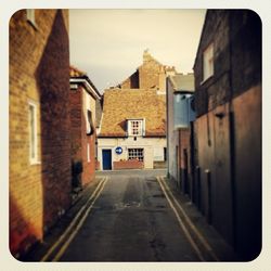 Narrow alley along buildings