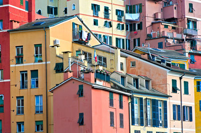 Low angle view of multi colored buildings in town