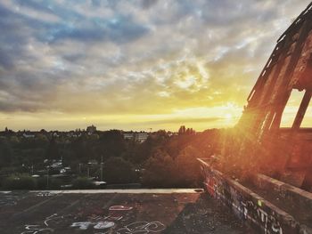 High angle view of road against cloudy sky during sunset