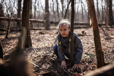 Full length of girl in forest