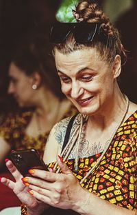 Young woman using mobile phone