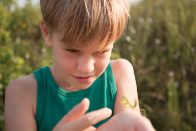 Portrait of boy looking at camera