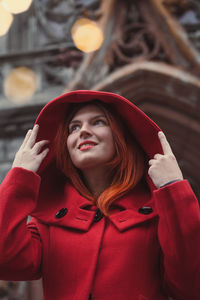 Close up happy woman on old city street portrait picture