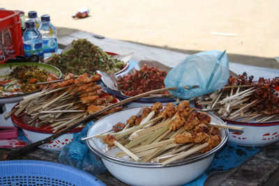 Street foods at market stall for sale