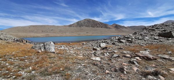 Scenic view of landscape and mountains against sky