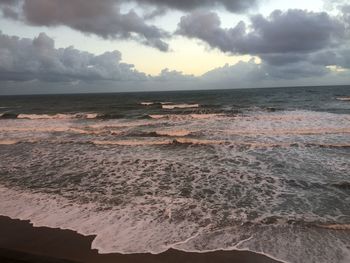 View of sea against cloudy sky