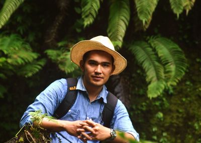 Portrait of young man looking away