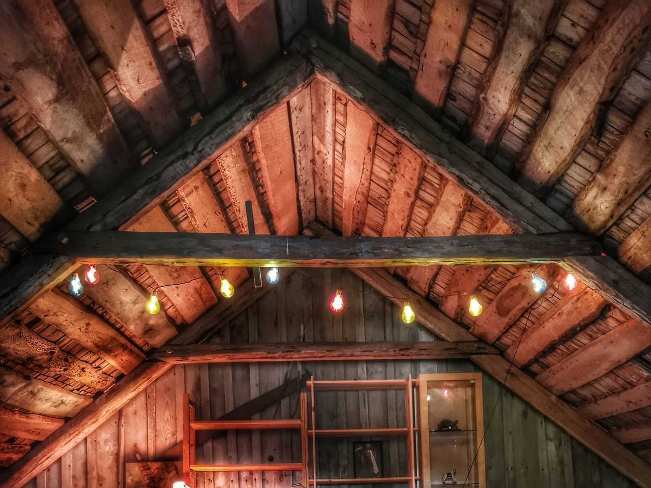 LOW ANGLE VIEW OF ILLUMINATED LIGHT CEILING OF BUILDING