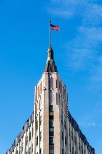 Low angle view of building against blue sky