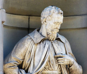 Close-up of statue against wall