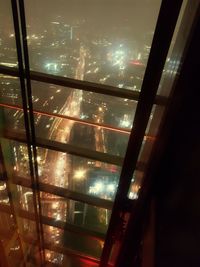 Low angle view of illuminated window at night