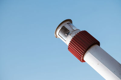 Low angle view of tower against clear blue sky