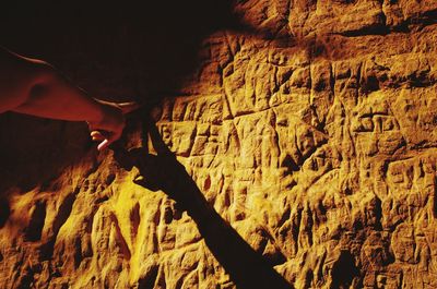 Person with text on wall