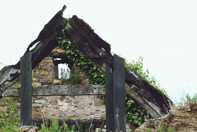 Low angle view of old ruin against clear sky