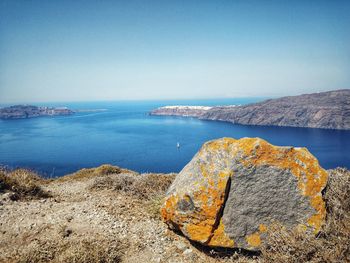 Scenic view of sea against clear blue sky