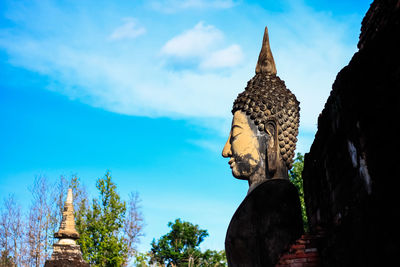 Statue of the buddha in sukhothai historical park thailand.