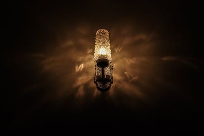 Low angle view of illuminated light bulb