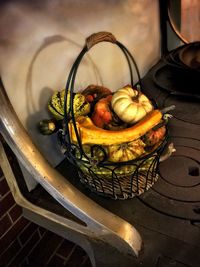 High angle view of fruits in basket on table