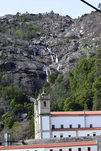 Built structure on mountain against the sky