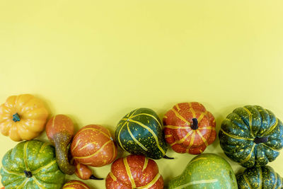 Close-up of multi colored candies against white background