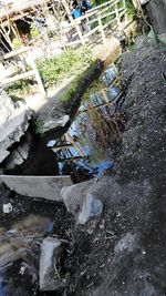 High angle view of puddle on road