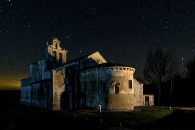 Exterior of old building against sky at night