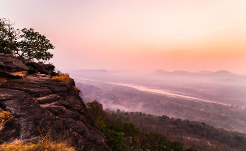 Scenic view of mountains against sky during sunset