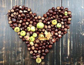 High angle view of fruits on wood