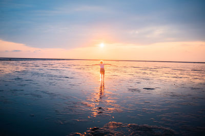 Scenic view of sea against sky during sunset