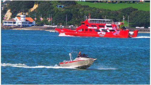 Red boat in water