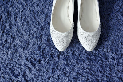 High angle view of shoes on rug