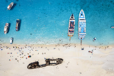 Aerial view of people enjoying at beach