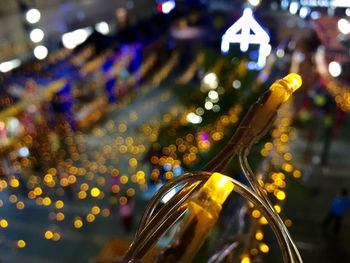 Close-up of illuminated lights at night