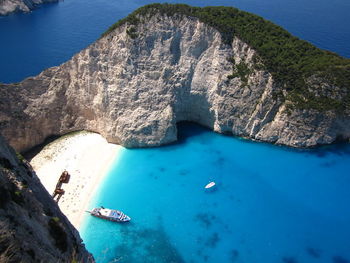 Scenic view of sea against blue sky